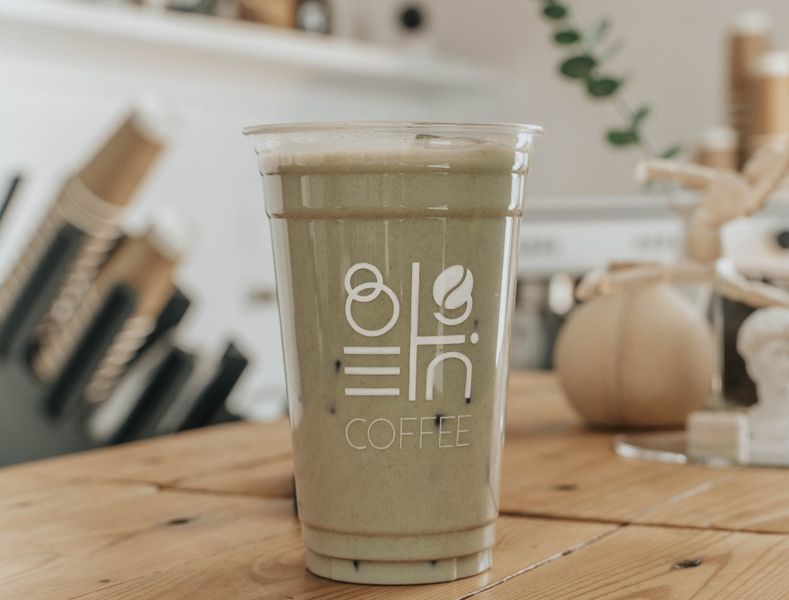 Iced matcha latte with oat milk