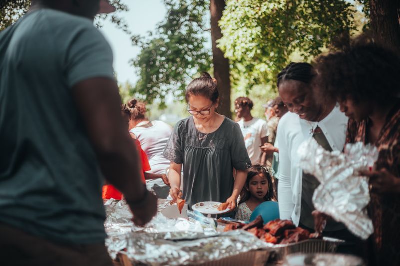 Chopt community event with local attendees enjoying fresh food